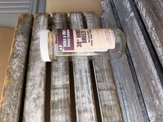 38° Honey Breeze mockup jar on rustic wood crate