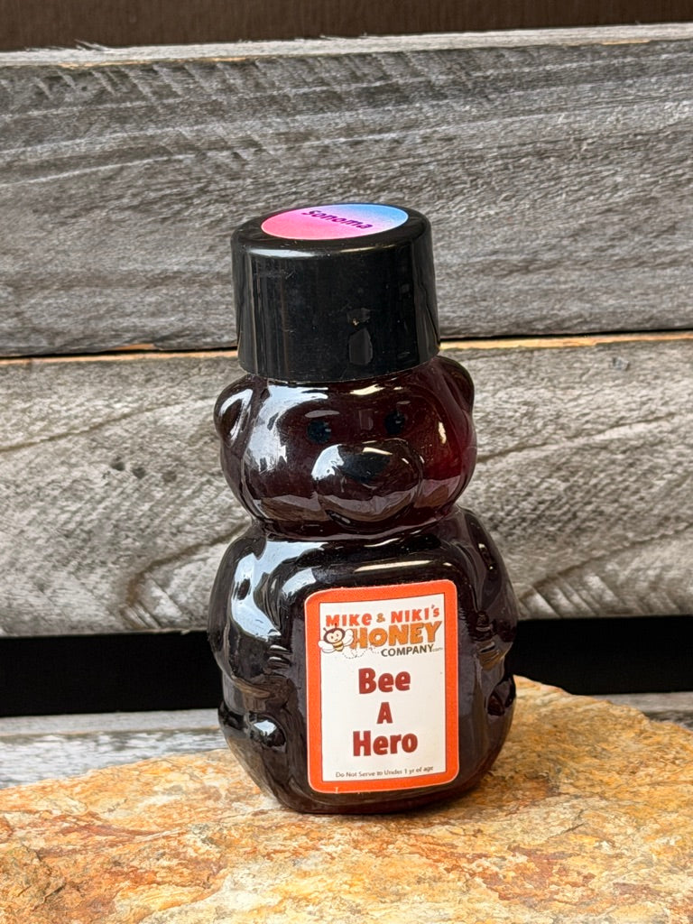 2oz Honey Bear – Bee A Hero personality black cap – collectible bear honey from Mike and Nikis Honey Company