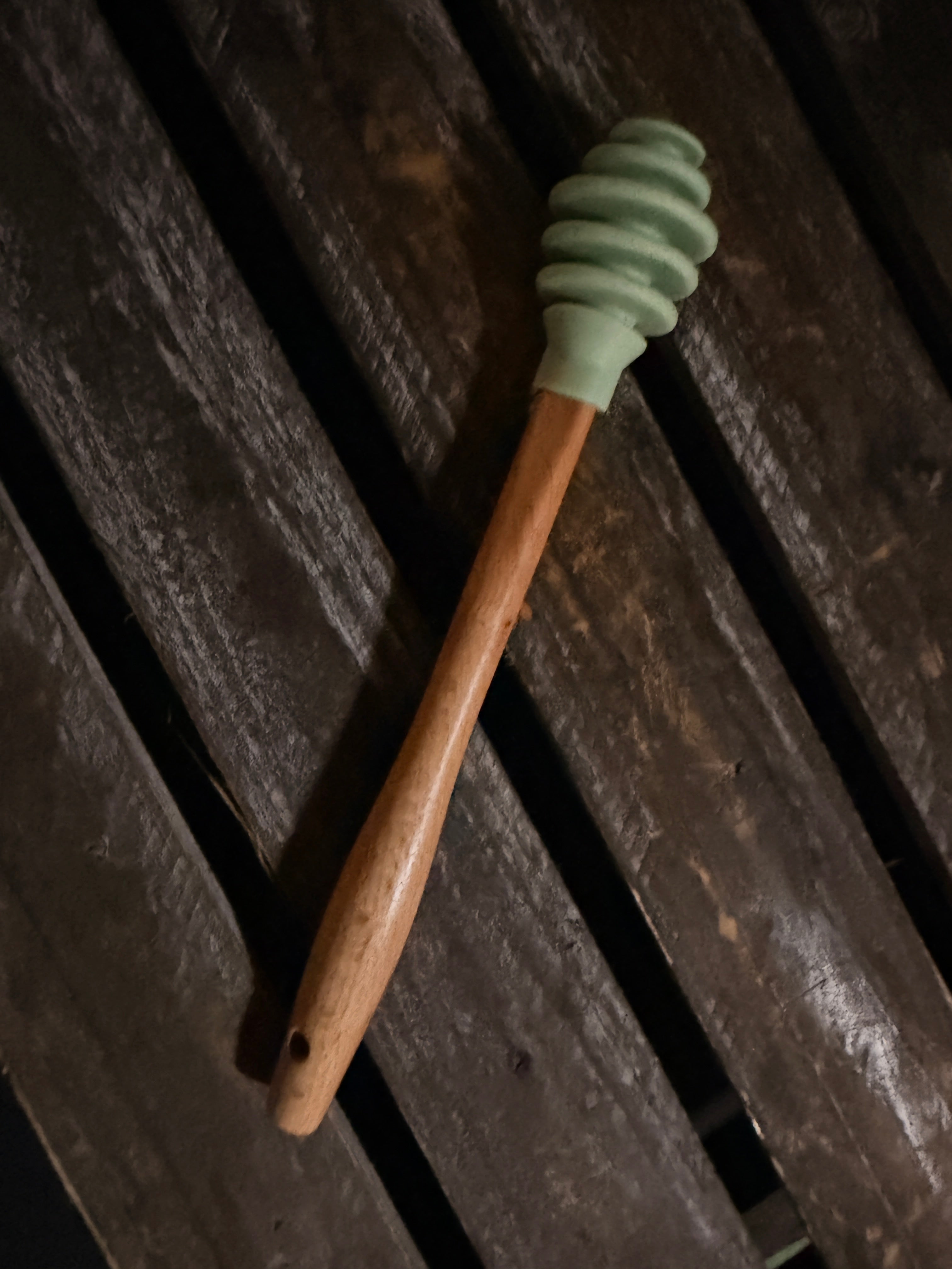 Pink silicone honey dipper with wood handle