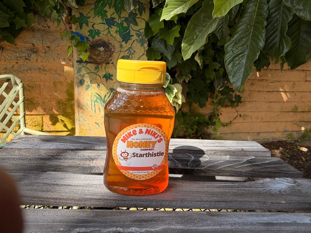 Starthistle Honey squeeze bottle light background